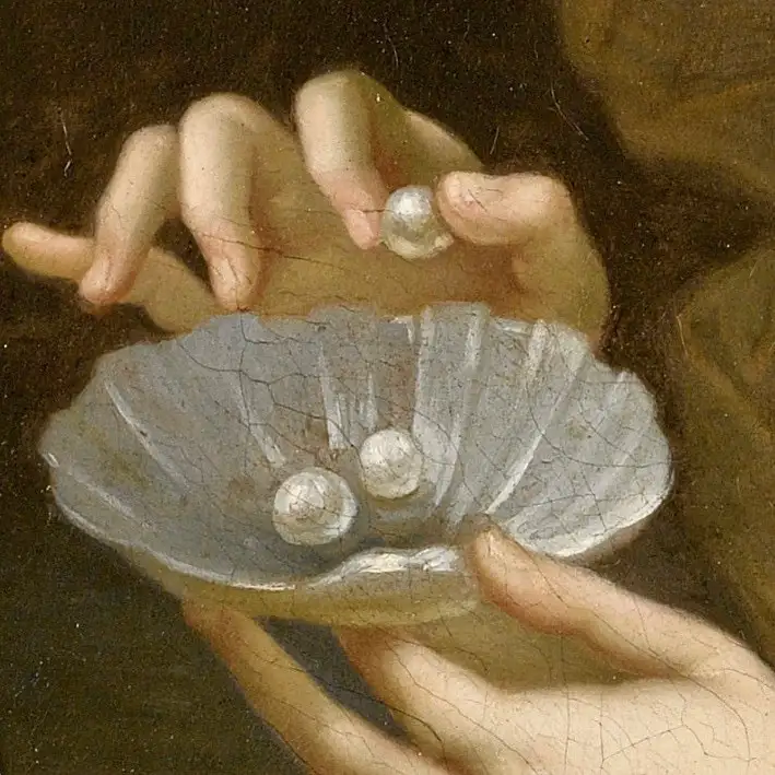A close-up of a classical painting shows two hands holding a scallop shell containing three pearls, with one pearl being…