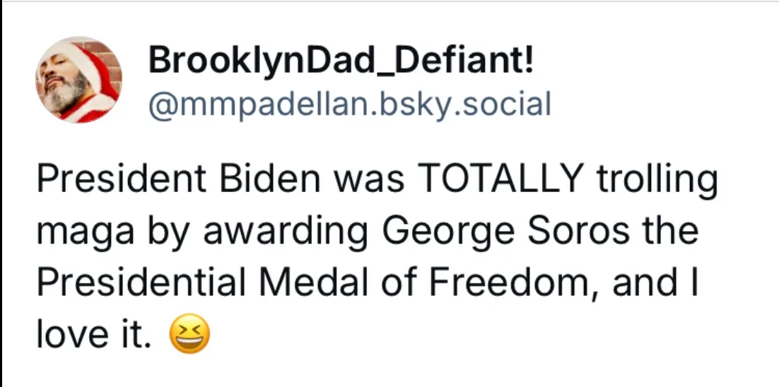 A screenshot of a social media post by 'BrooklynDad_Defiant!' featuring a profile picture of a man in a Santa hat. The…