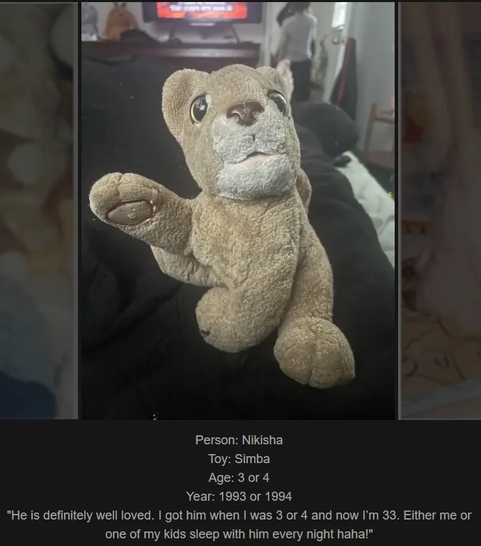 A close-up photo of a well-worn, light brown plush lion toy, identified as Simba, with visible wear on its paw and face. The…