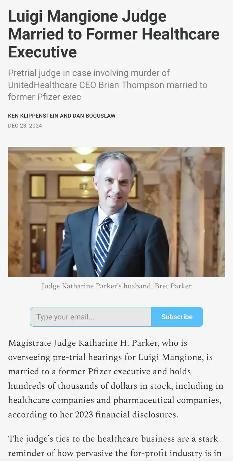 The image shows a screenshot of a news article featuring a photo of a man in a suit and tie, identified as Bret Parker…