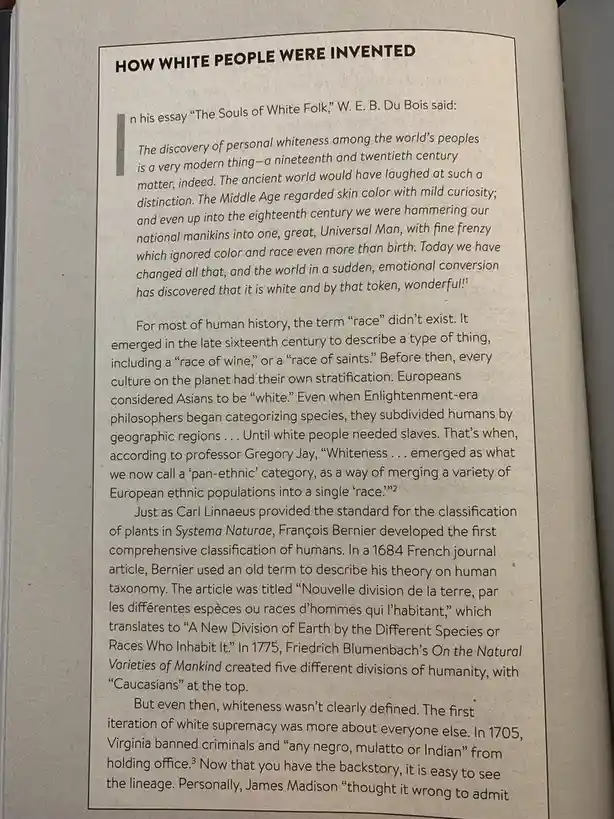 A close-up photo of a printed page titled 'HOW WHITE PEOPLE WERE INVENTED' that quotes W.E.B. Du Bois and discusses the…