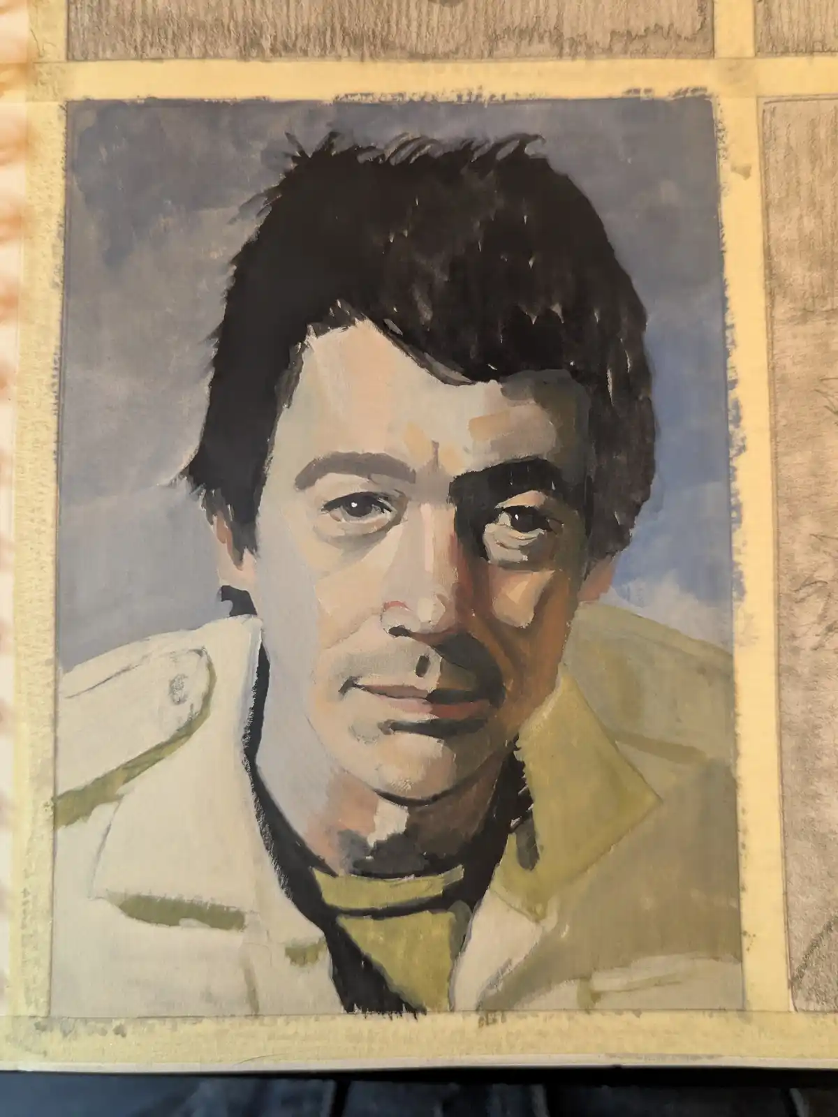 A hand-painted portrait of a man with dark hair and a mustache, wearing a light-colored jacket, is shown with a visible…