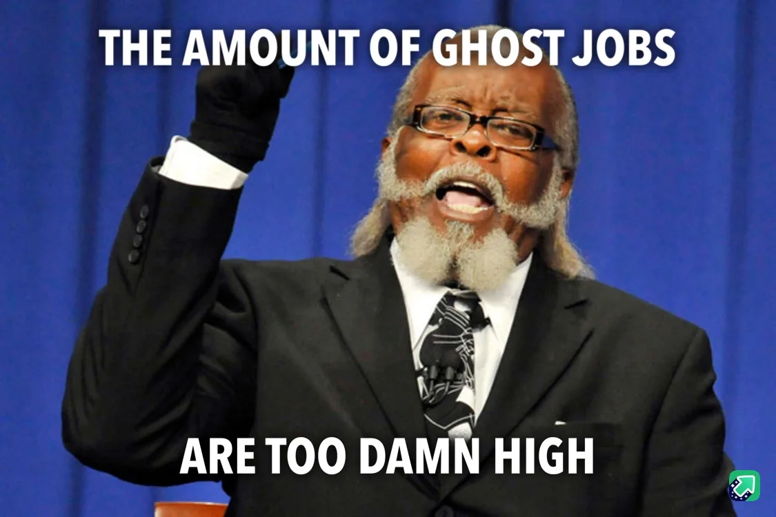 A man in a black suit and glasses, with a white beard and black gloves, raises his right fist in anger against a blue…
