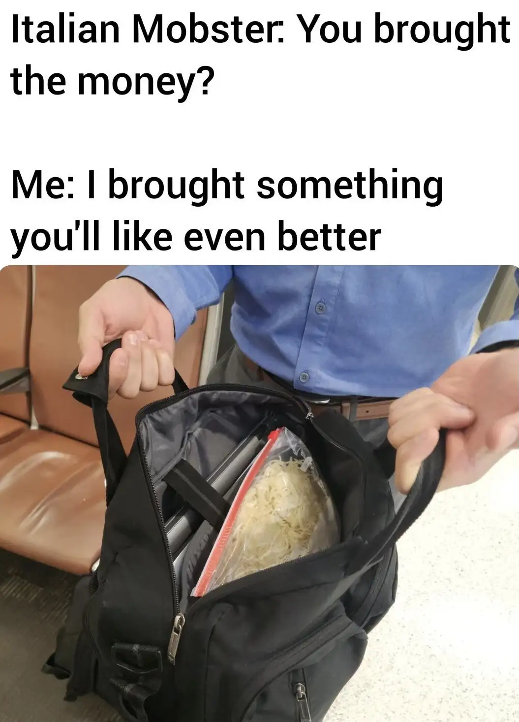 A person in a blue shirt opens a black backpack to reveal a large bag of uncooked spaghetti inside, contrasting with the…