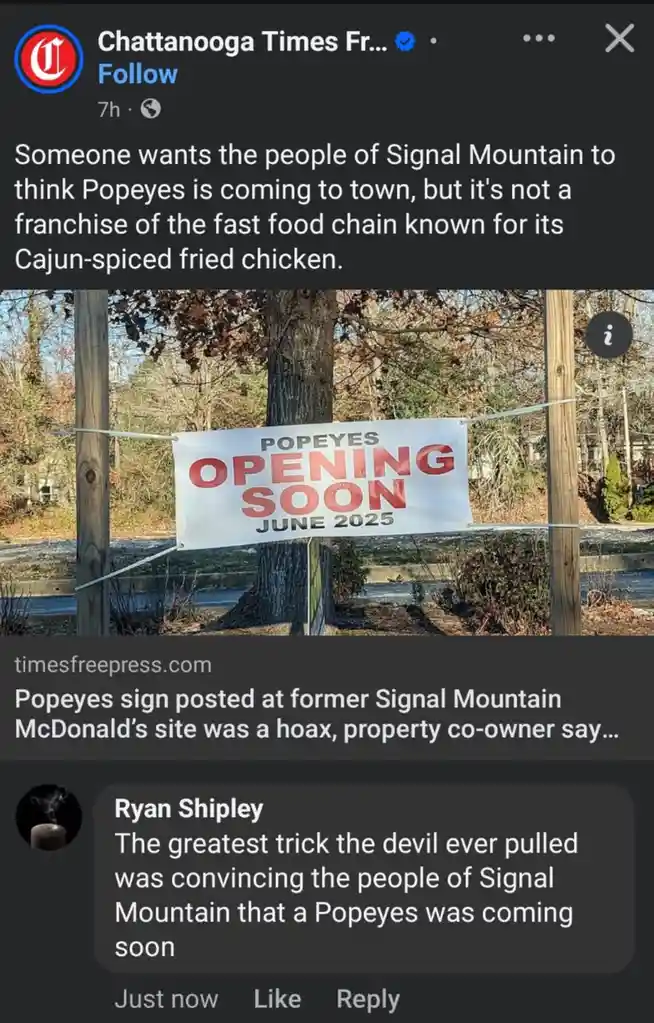 A white banner strung between two wooden posts outdoors reads 'POPEYES OPENING SOON JUNE 2025' in red and black text. The…