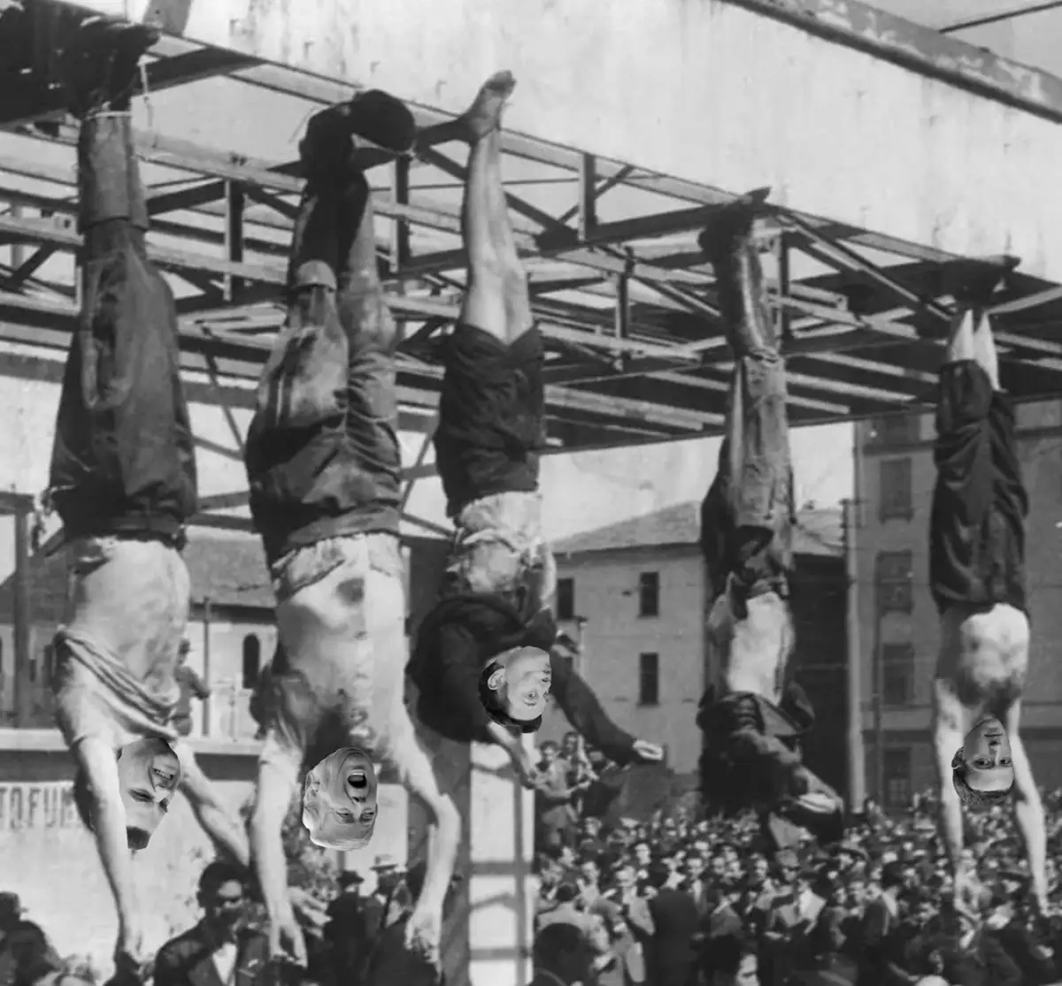 A black-and-white historical photo shows five men hanging upside down from a metal structure, with crowds watching below…