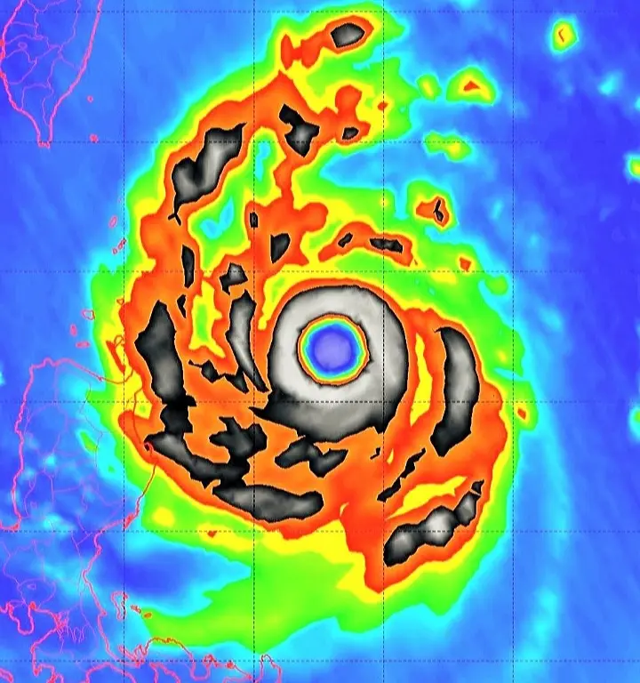 a satellite image of a hurricane with a distinct eye, overlaid with the text 'this is a hurricane with a blue eye'. The…