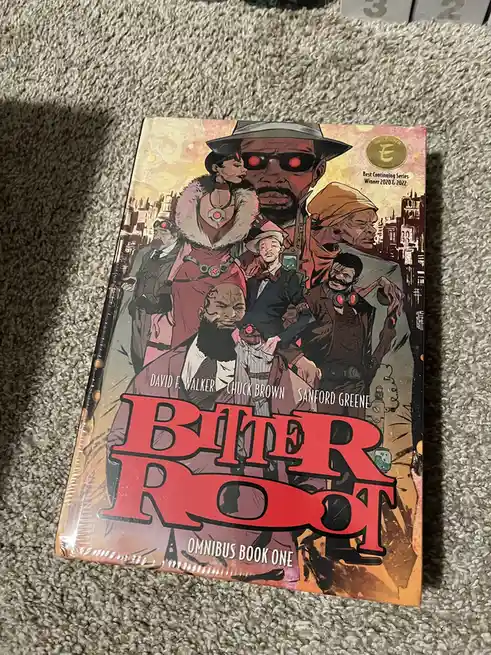 A comic book titled 'Bitter Root Omnibus Book One' by David F. Walker, Chuck Brown, and Sanford Greene, featuring a cover…