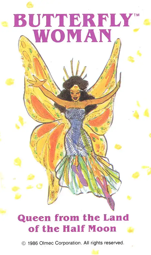 An illustrated trading card from 1986 shows a woman with large butterfly wings, wearing a colorful dress and a crown…