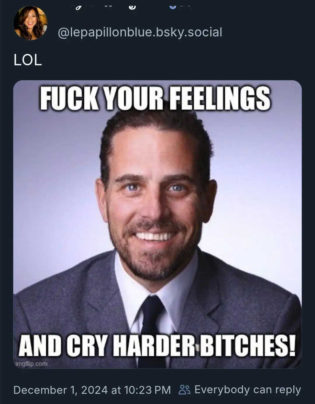 A man in a suit and tie smiles broadly at the camera with bold white text overlaid that reads 'FUCK YOUR FEELINGS' at the…