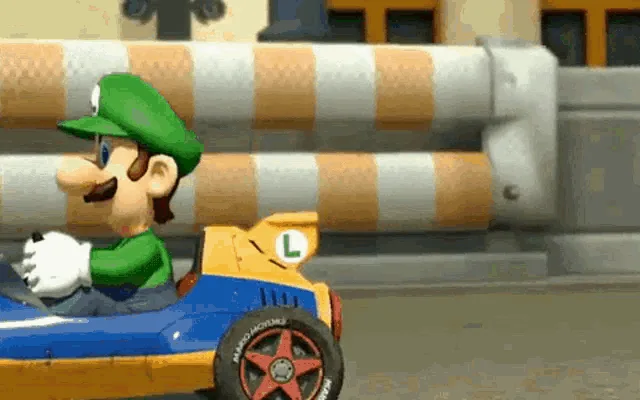The image shows Luigi from Mario Kart driving a blue and yellow kart, with his face progressively becoming more distorted…