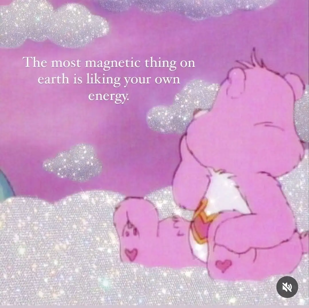 A pink cartoon bear sits on a glittery cloud against a sparkly purple sky, holding a small white creature. White text…