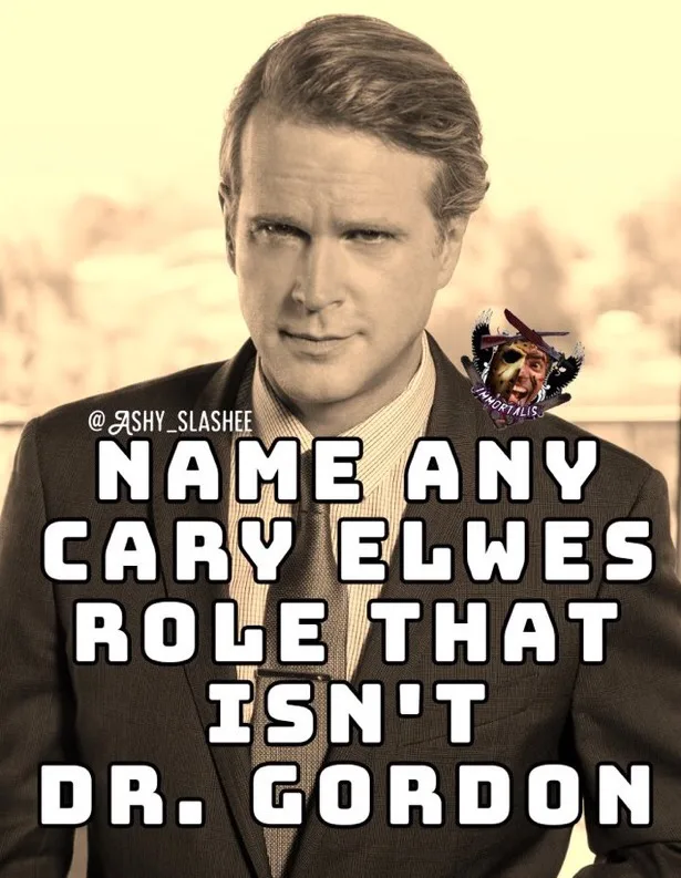 A sepia-toned image of actor Cary Elwes in a suit and tie, looking directly at the camera with a serious expression. Large…