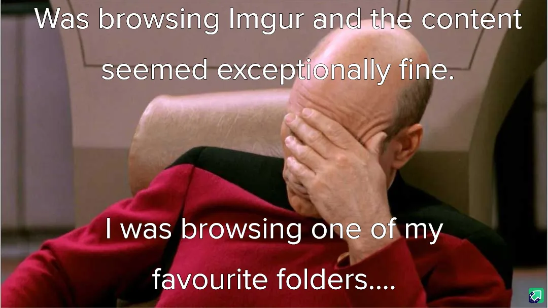 A bald man in a red uniform sits in a chair, covering his face with his hand in a gesture of despair or embarrassment. The…