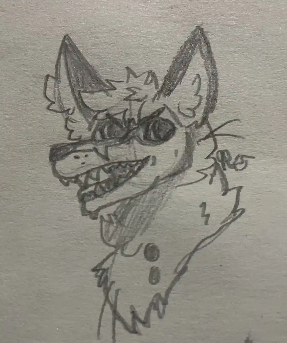 A rough pencil sketch on textured paper depicts a cartoonish, anthropomorphic fox-like creature with pointed ears, wide…