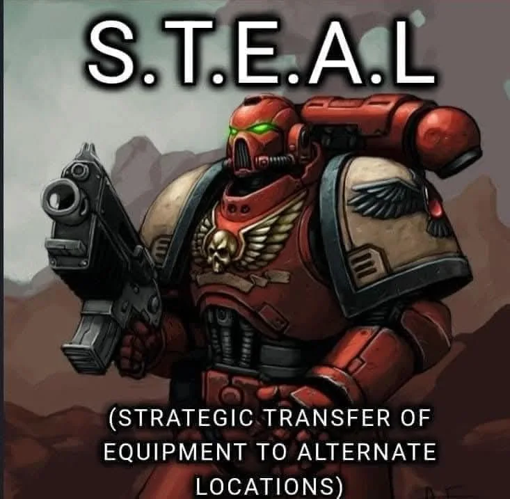 A red-armored space marine with glowing green eyes holds a gun, standing in a rocky landscape. Large white text at the top…