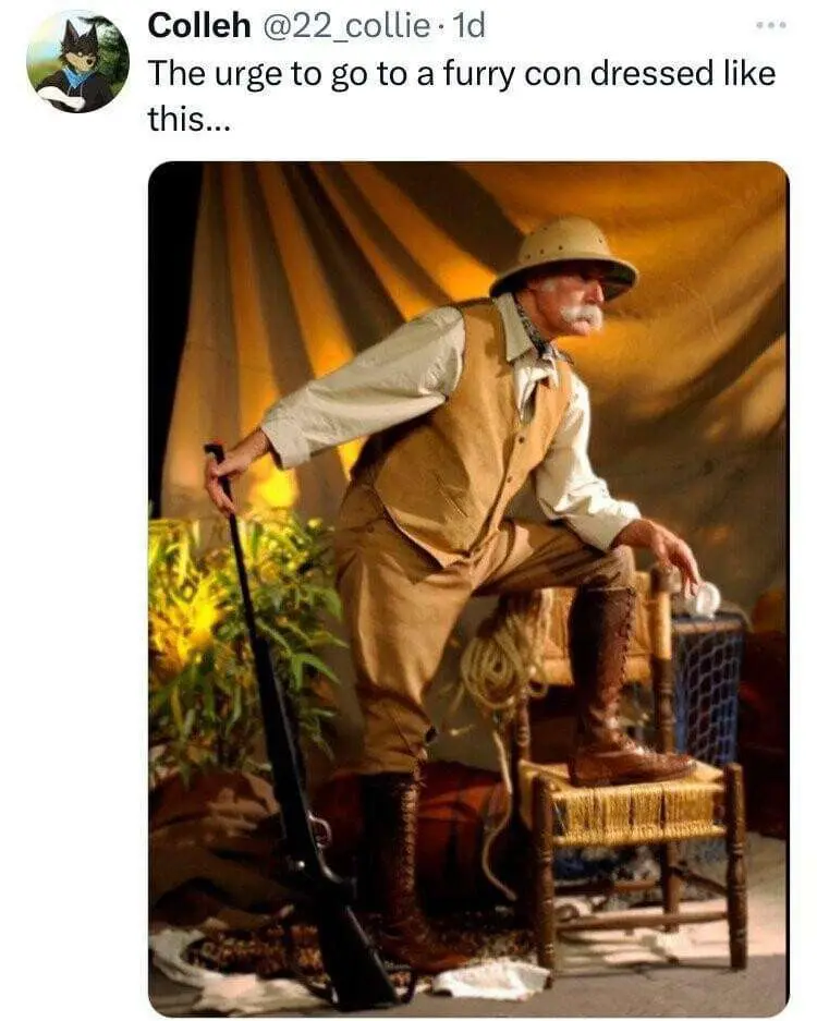 A man in a safari outfit with a pith helmet, vest, and boots is posed leaning on a rifle while sitting on a wicker chair…