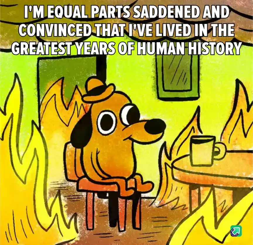 A cartoon dog wearing a hat sits calmly in a chair surrounded by flames, with a mug on a table nearby. The overlaid text…