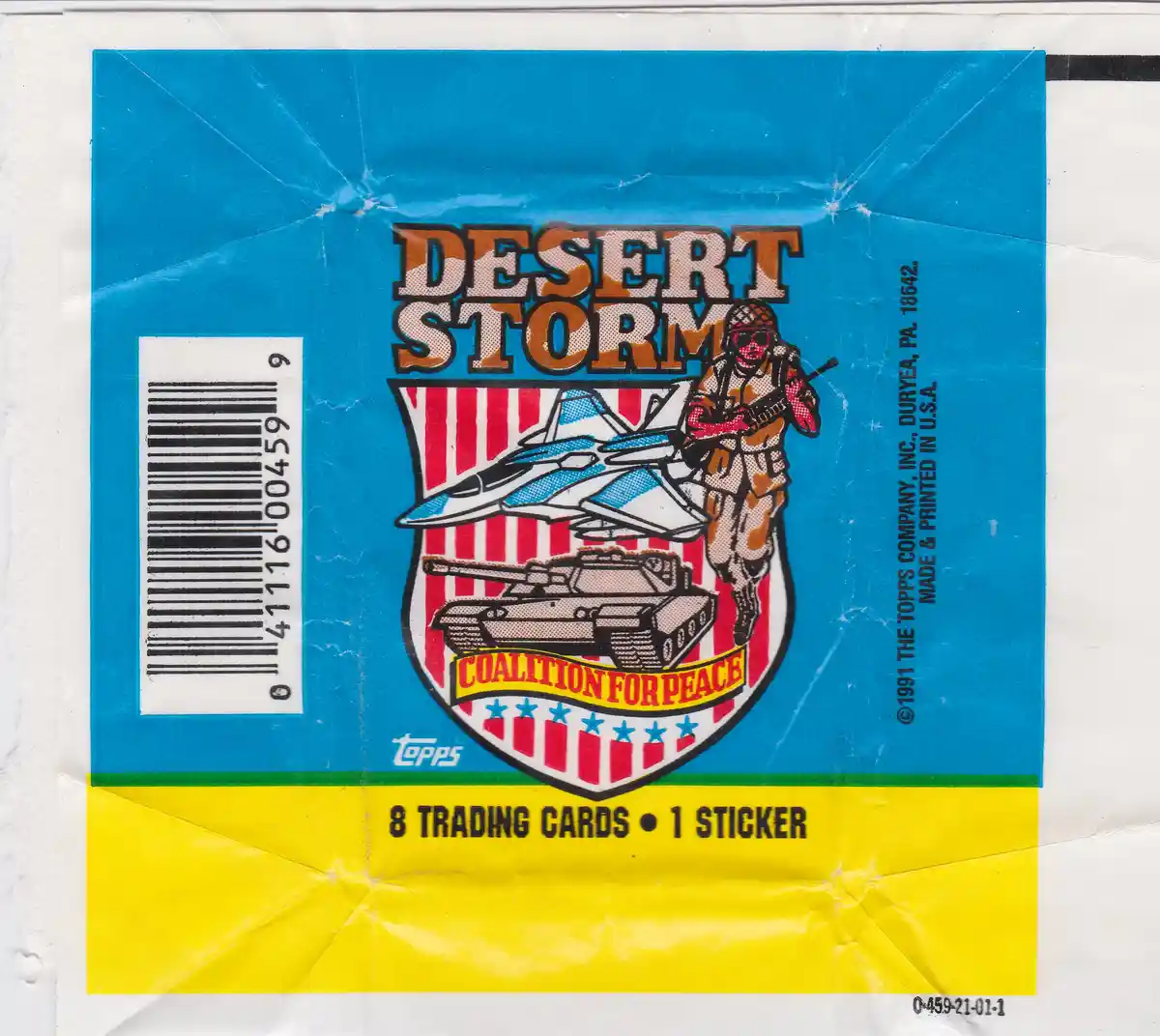 A crinkled, blue and yellow 1991 Topps trading card pack wrapper for 'Desert Storm' featuring a shield logo with a soldier…