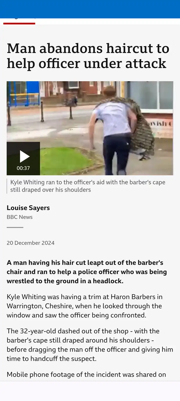 A man in a barber's cape is seen running away from a barbershop toward a police officer being attacked on a sidewalk. The…