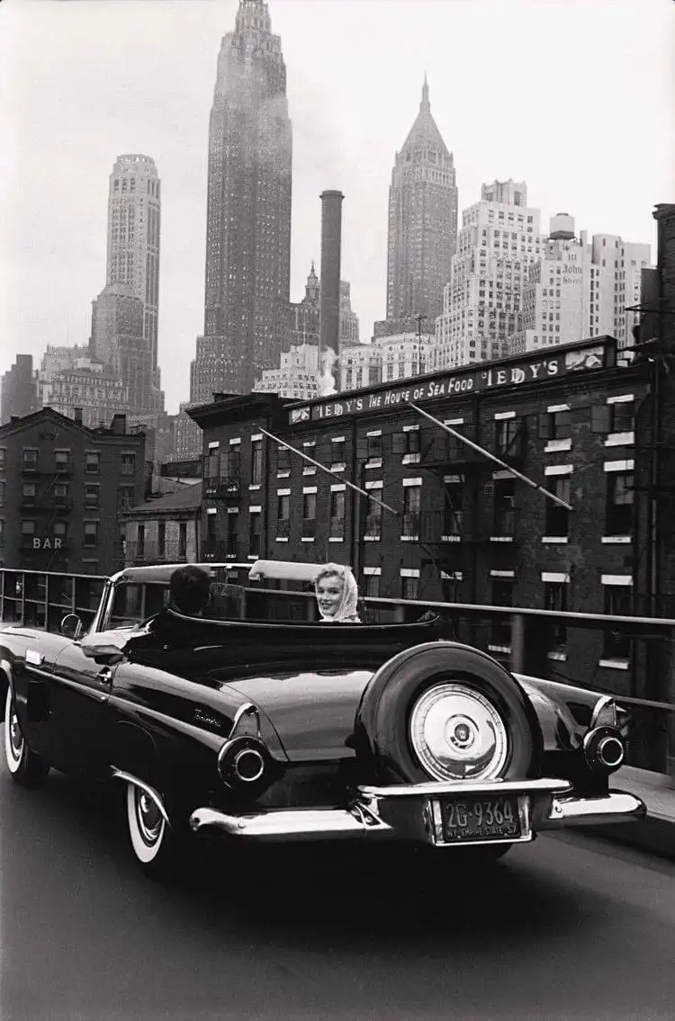 Marilyn Monroe cruising through NYC in her stunning 1955 black Ford Thunderbird, a gift from Milton Greene