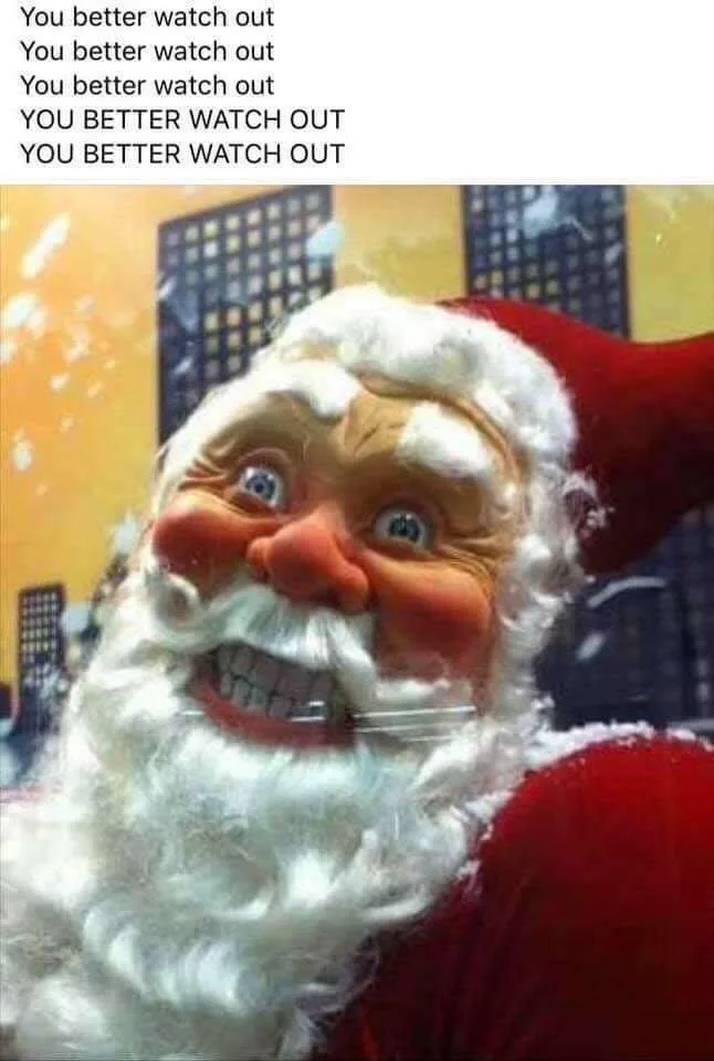 A close-up image of a plastic Santa Claus figurine with a wide, toothy grin and bulging eyes, set against a snowy cityscape…