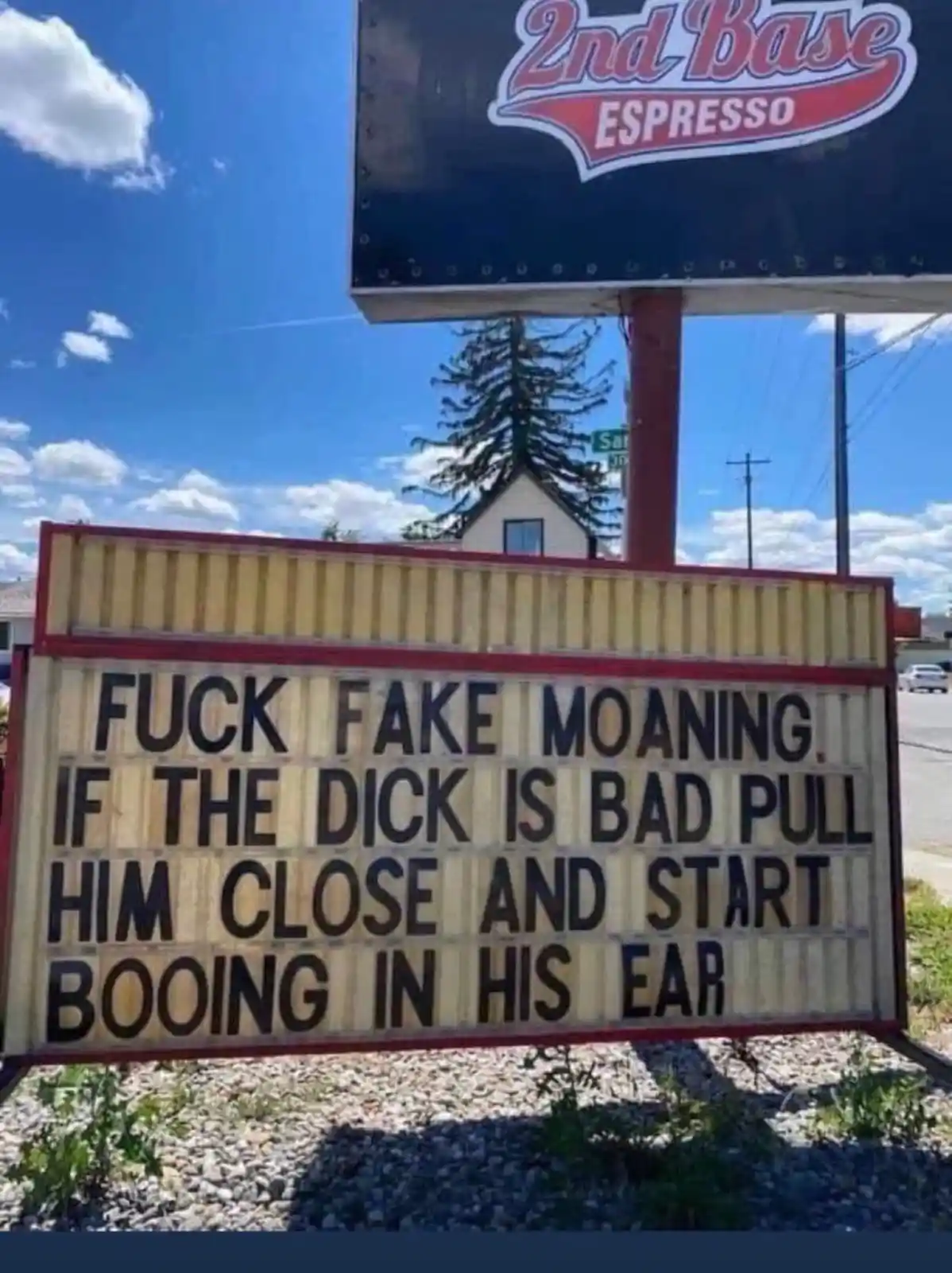 A photo of a weathered, light-colored marquee sign with black lettering that reads 'FUCK FAKE MOANING. IF THE DICK IS BAD…