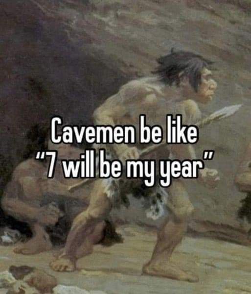 A painting depicts a muscular caveman holding a spear, looking determined, while another caveman is visible in the…