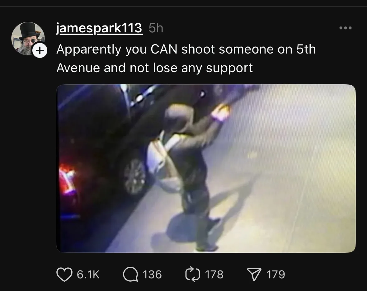 A low-resolution, grainy security camera image shows a person in a dark hoodie and pants, carrying a light-colored backpack…