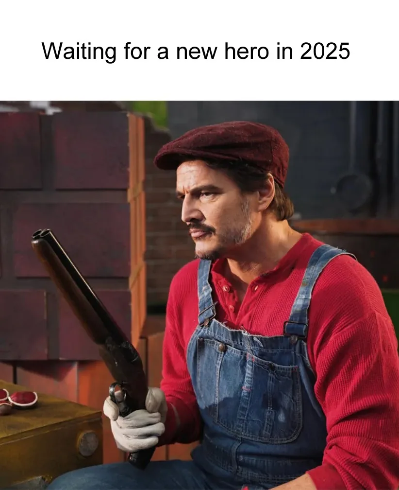 A man in a red shirt, blue overalls, and a red cap holds a shotgun while looking off to the side with a weary expression…