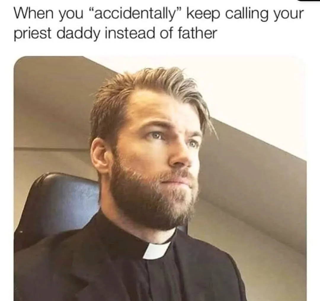 A man with a beard and short hair, wearing a black clerical collar shirt, sits in a chair and looks upward with a mildly…