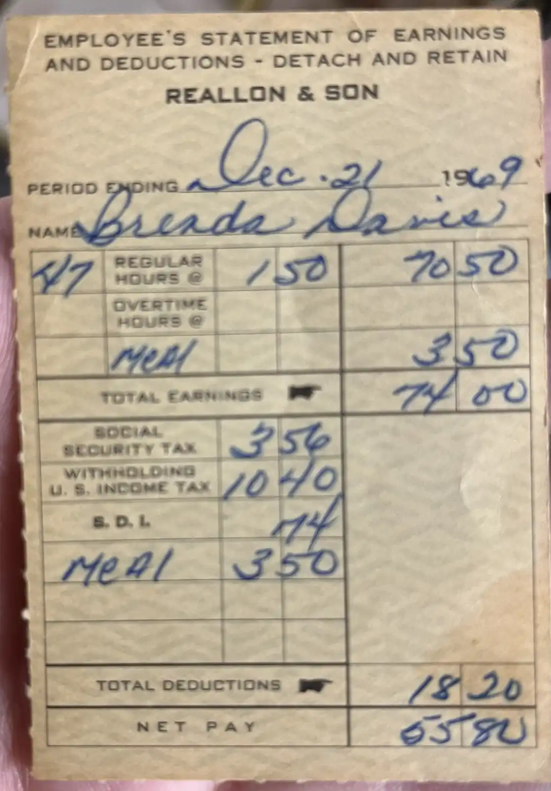 A vintage 1969 employee pay stub from 'Reallon & Son' for Brenda Davis, showing handwritten entries where 'meal' is listed…
