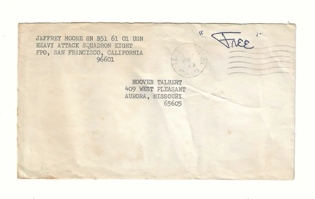 A vintage, slightly stained envelope shows a military return address for Jeffrey Moore, USN, in San Francisco, and a…
