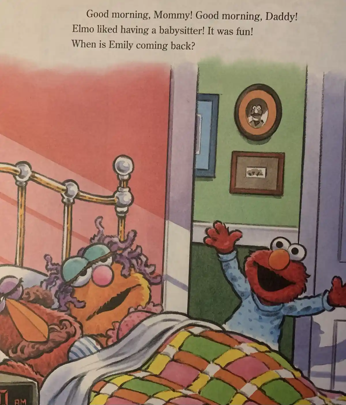 A colorful children's book illustration shows Elmo, a red furry character, jumping out of bed with arms raised in…