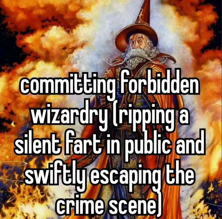 An illustration of a stern-looking wizard with a long white beard and pointed hat stands against a fiery, stormy sky. Large…
