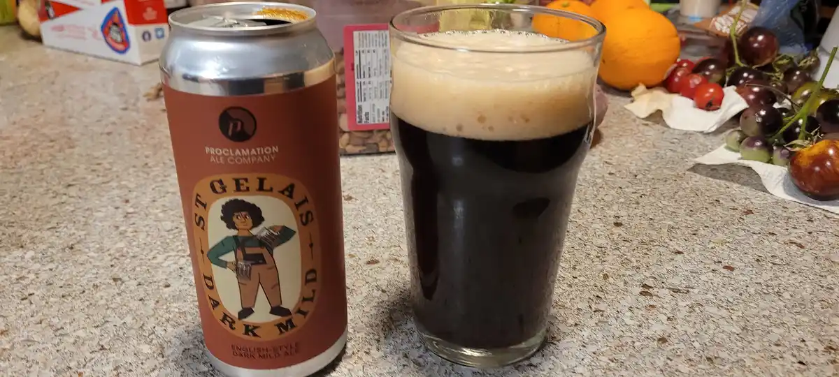 A can of Proclamation Ale Company's 'St. Gelais Dark Mild' English-style ale sits next to a glass filled with the dark beer…