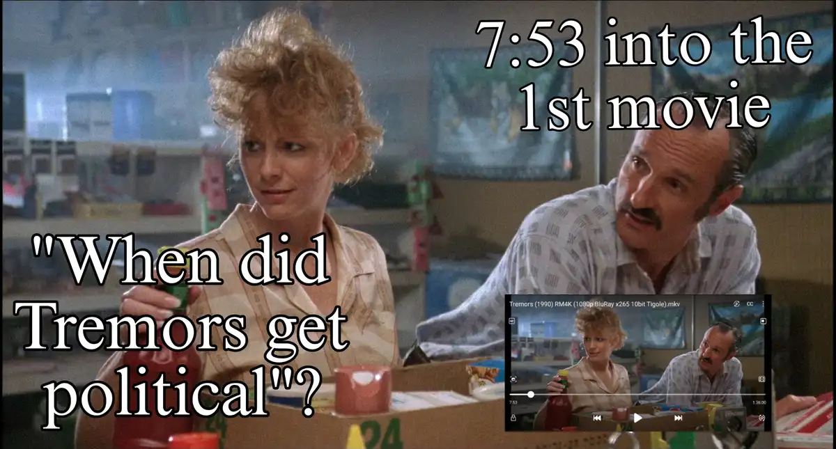 A still from the 1990 movie 'Tremors' shows a woman holding a ketchup bottle and a man with a mustache looking at her…