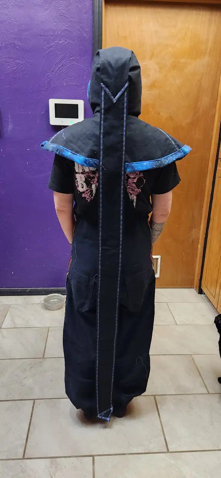 Rocking the unique style: Liripipe hood fashion.