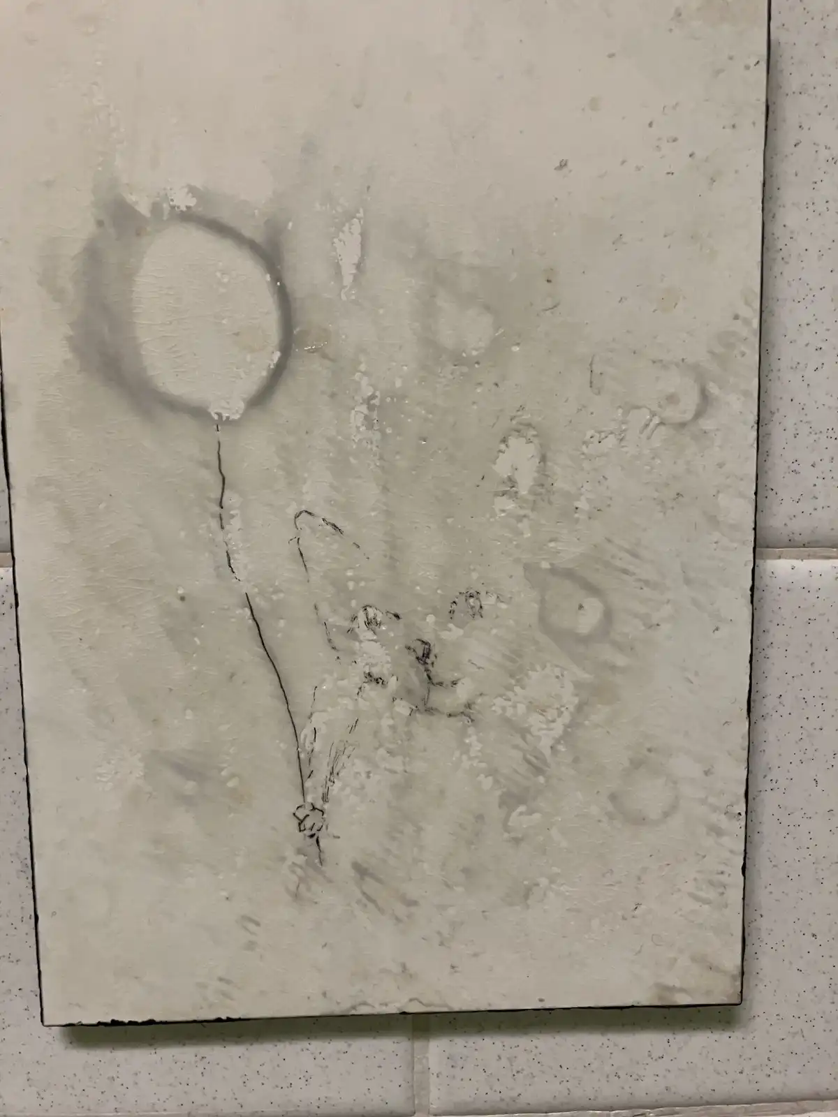 A weathered, off-white canvas with a faint, childlike drawing of a balloon tied to a stick figure, set against a speckled…