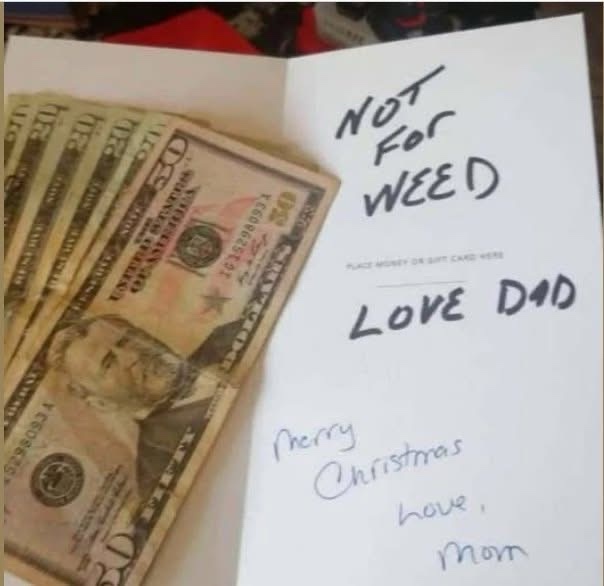 A handwritten Christmas card from 'Mom' to 'Dad' with a stack of US $20 bills placed beside it. The card has a note in black…
