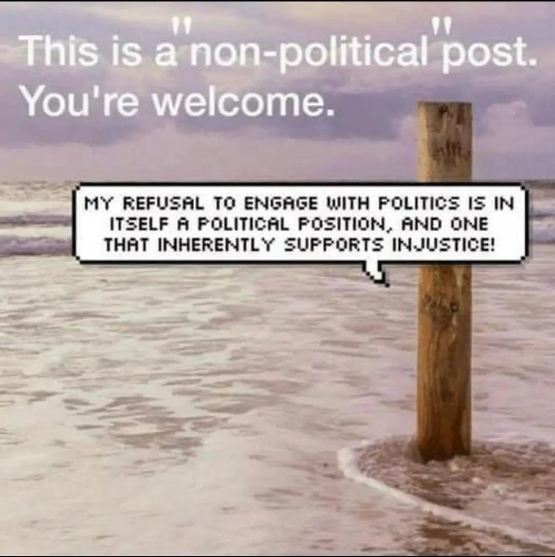 An image of a wooden post in shallow ocean water with a speech bubble that reads 'MY REFUSAL TO ENGAGE WITH POLITICS IS IN…