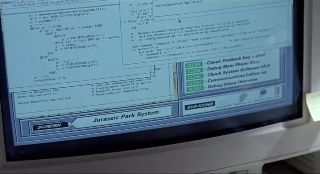 A close-up of a computer monitor displaying the Jurassic Park System interface, showing lines of Pascal code and a list of…