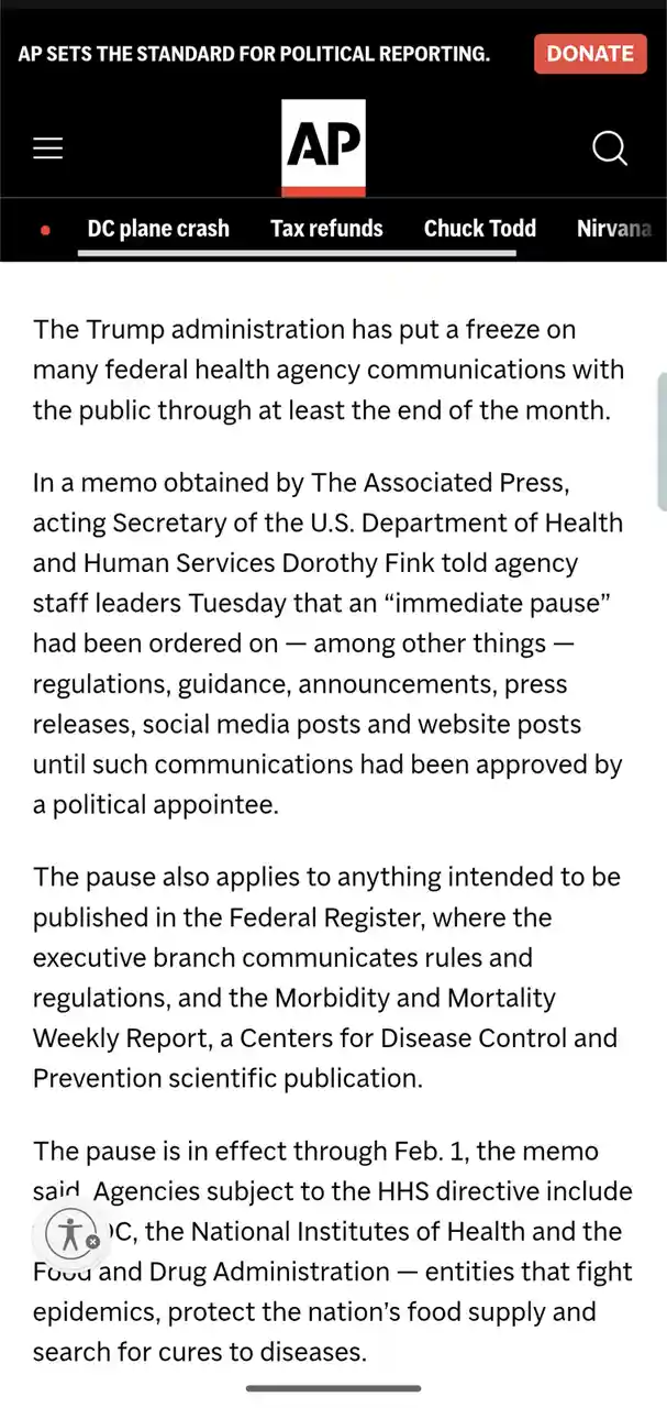 A screenshot of an Associated Press news article about a Trump administration memo freezing federal health agency…