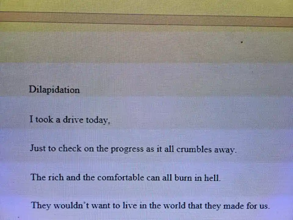 The image shows a computer screen displaying text titled 'Dilapidation,' which reads: 'I took a drive today. Just to check…