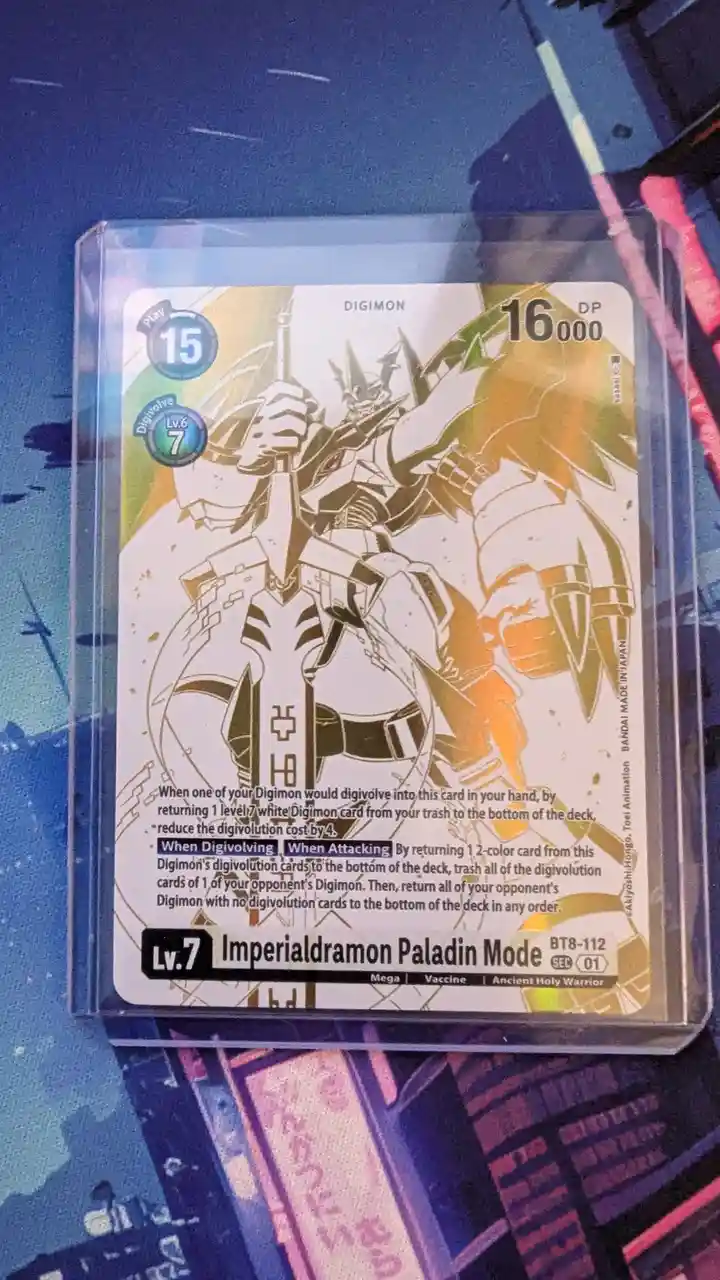 A Digimon trading card featuring Imperialdramon Paladin Mode, a Level 7 Mega Vaccine Ancient Holy Warrior with 16,000 DP…