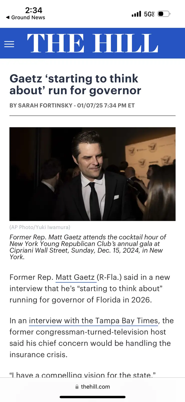 A screenshot of a news article from 'THE HILL' shows a photo of former Rep. Matt Gaetz smiling at an event. The headline…