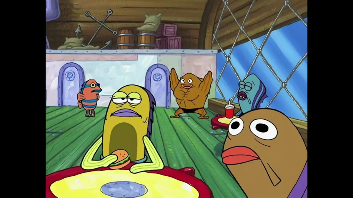 A still from the animated show 'SpongeBob SquarePants' featuring several characters in a room with green flooring and wooden…