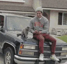 A six-panel meme sequence shows a man with a grey cat on his shoulder, then the cat looking intensely at the camera, then a…