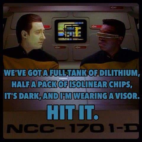 Two men in Starfleet uniforms sit in a spaceship cockpit, one wearing a visor. Overlaid text reads: 'WE'VE GOT A FULL TANK…