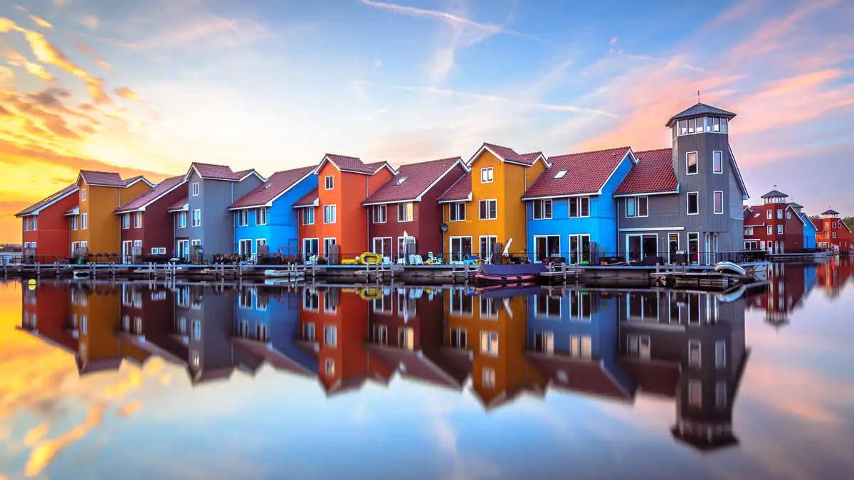 Groningen's cityscape is a vibrant mix of traditional Dutch architecture, midcentury blocky buildings, and experimental…